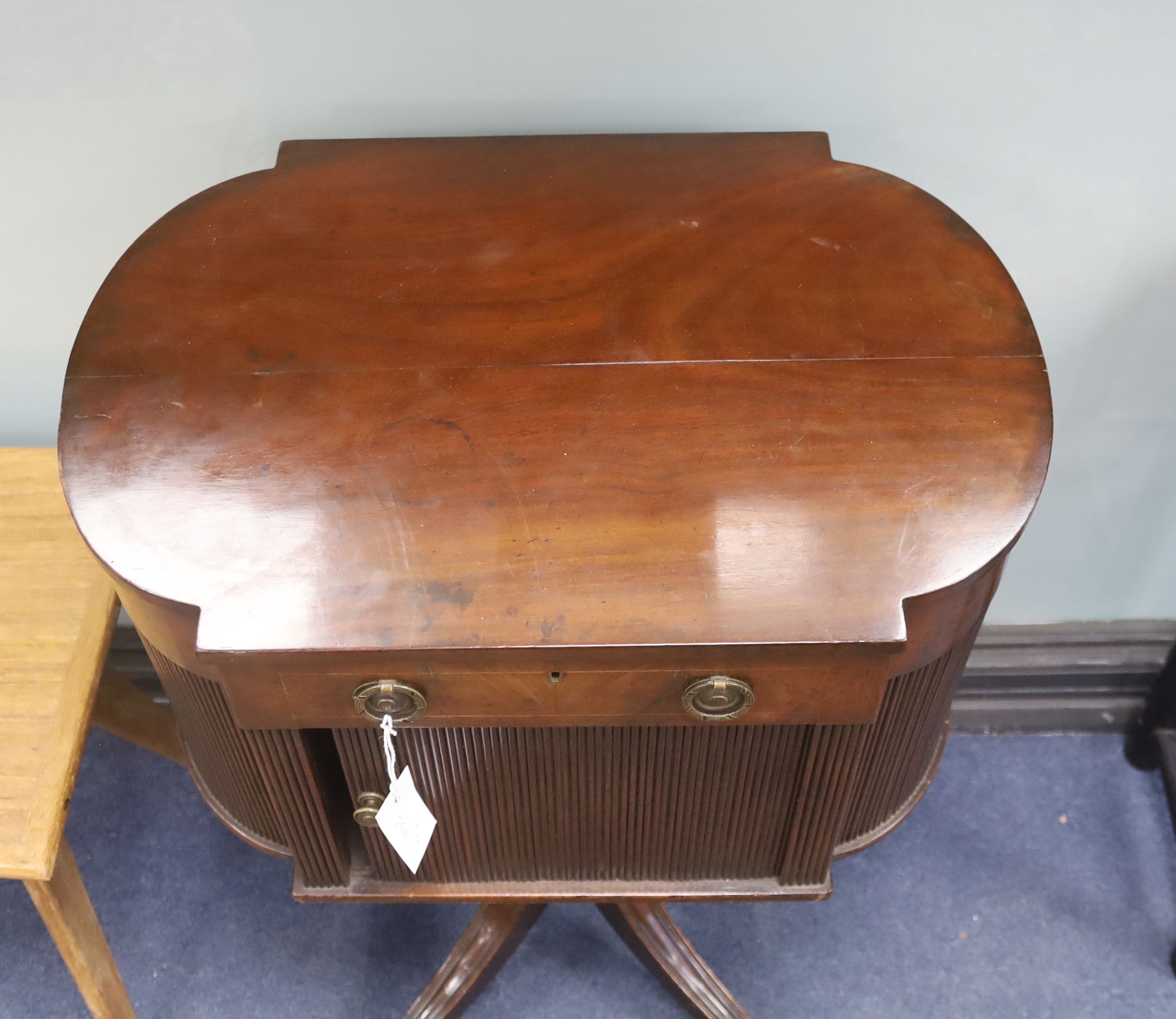 A George III mahogany enclosed wash stand with tambour cupboard, width 56cm, depth 38cm, height 78cm